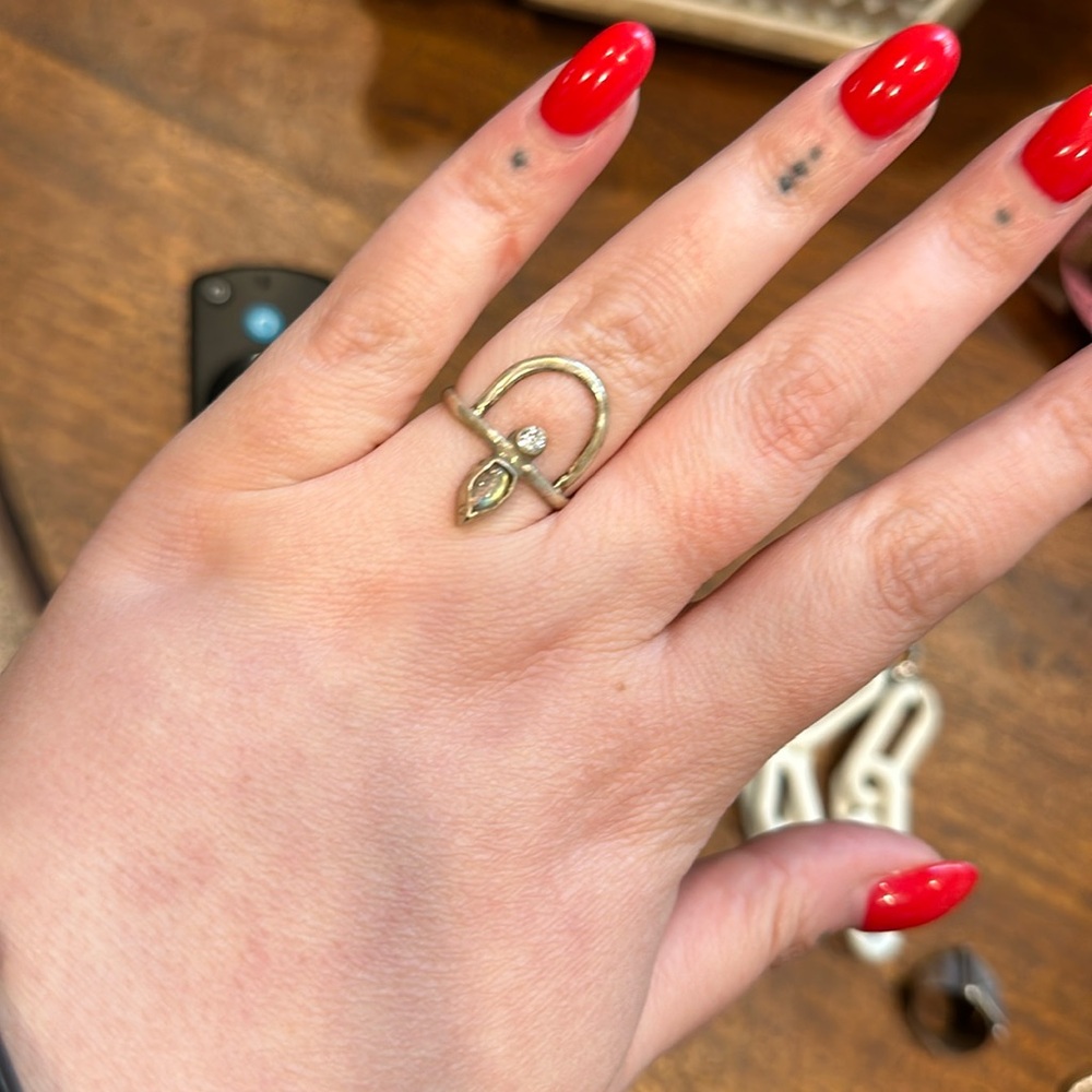 Handmade sterling silver labradorite and white topaz ring.